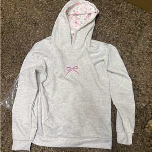 New! Popular UrbanCamo Bow sweatshirt. Adult small